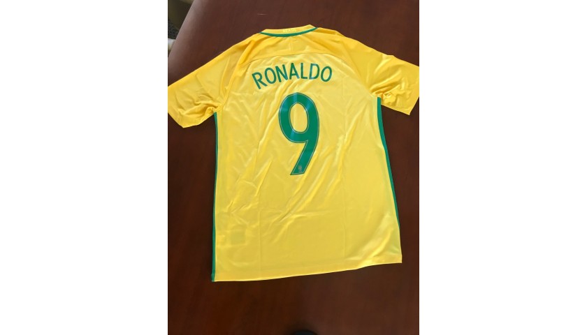 Brazil National Team Shirt Signed By Pele, Ronaldo Nazario, Ronaldinho &  Roberto Carlos - CharityStars