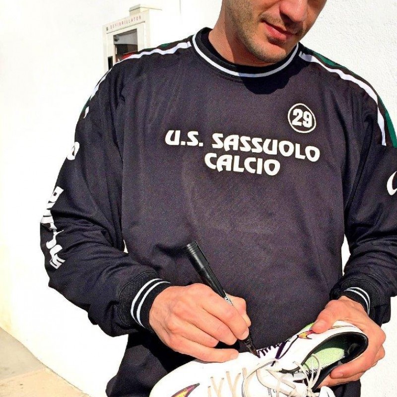 Magnanelli and Cannavaro give you Cannavaro's worn and signed boots