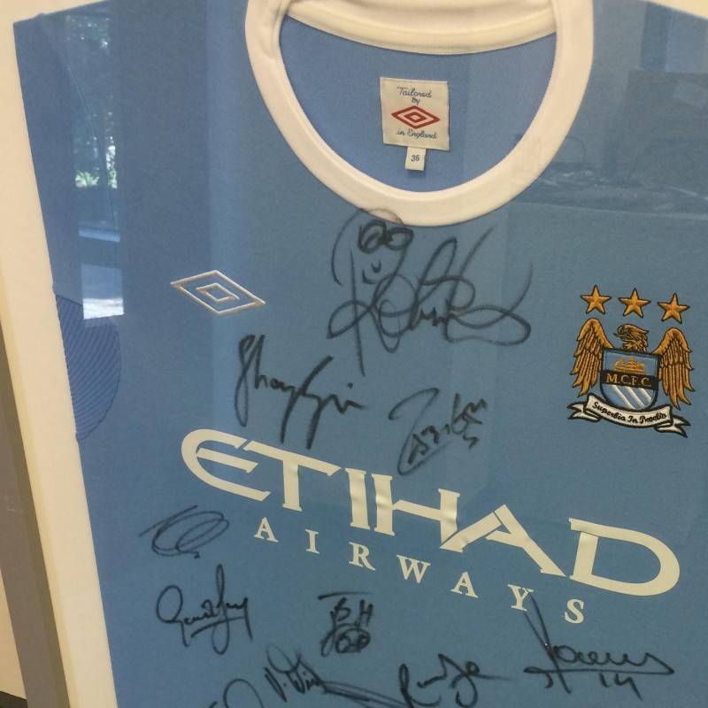 Framed Manchester City 09/10 Home Shirt Signed by the Squad