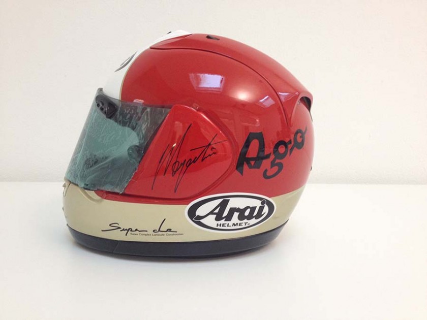 Helmet signed by Giacomo Agostini