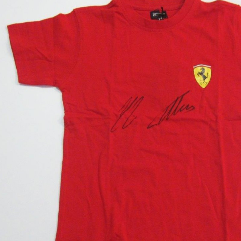 T-shirt Ferrari autografata da Alonso e Räikkönen