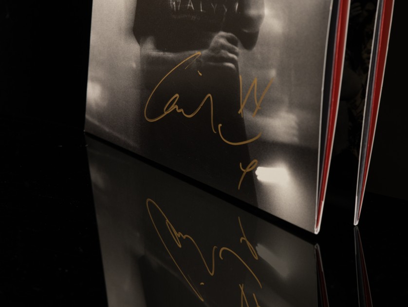 Win Louis Tomlinson's Signed Live Album Vinyl