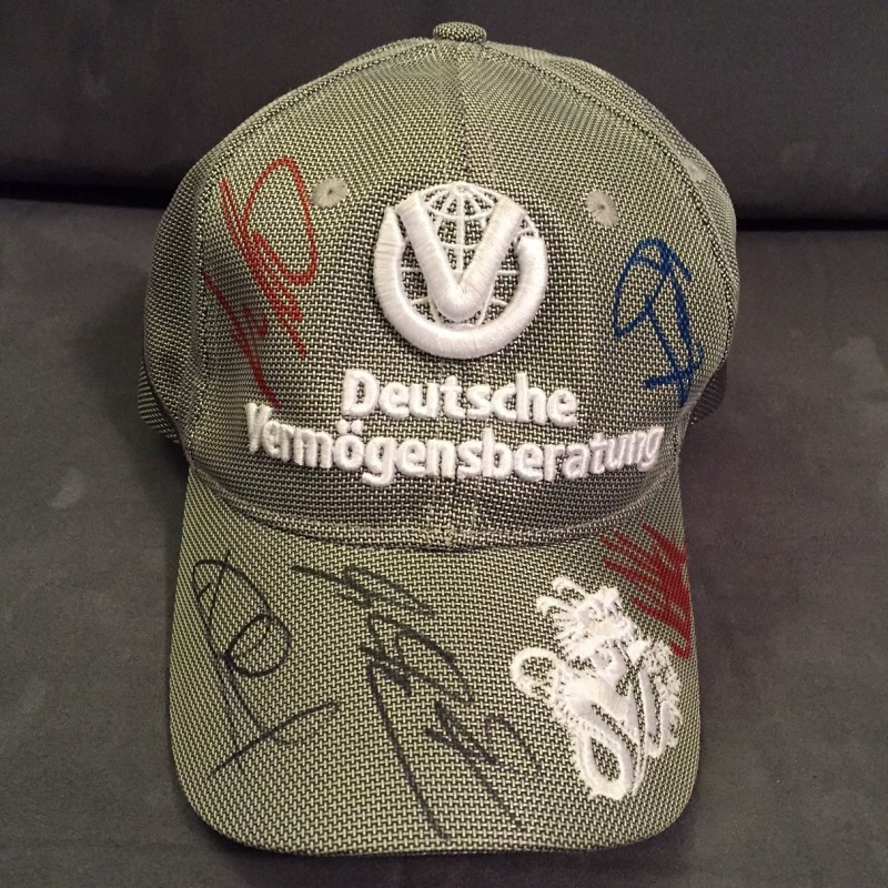 Original Mercedes 2010 hat, signed by Schumacher, N.Rosberg, K.Rosberg, Haug and Brawn