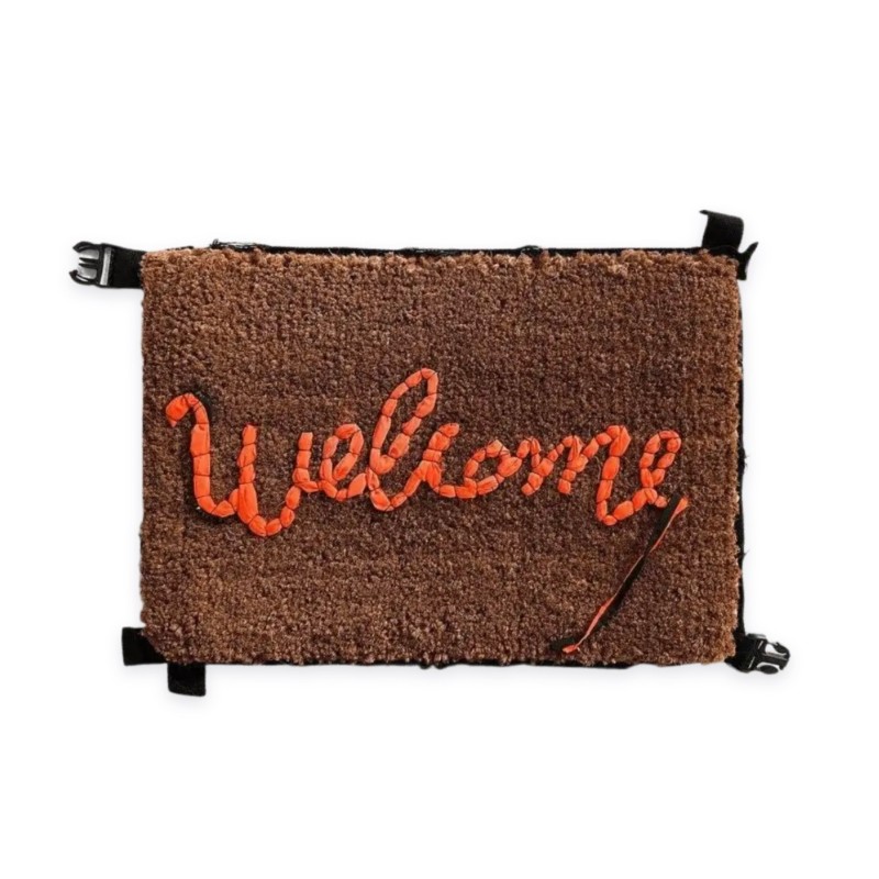 "Welcome Mat - Love Welcomes" by Banksy 