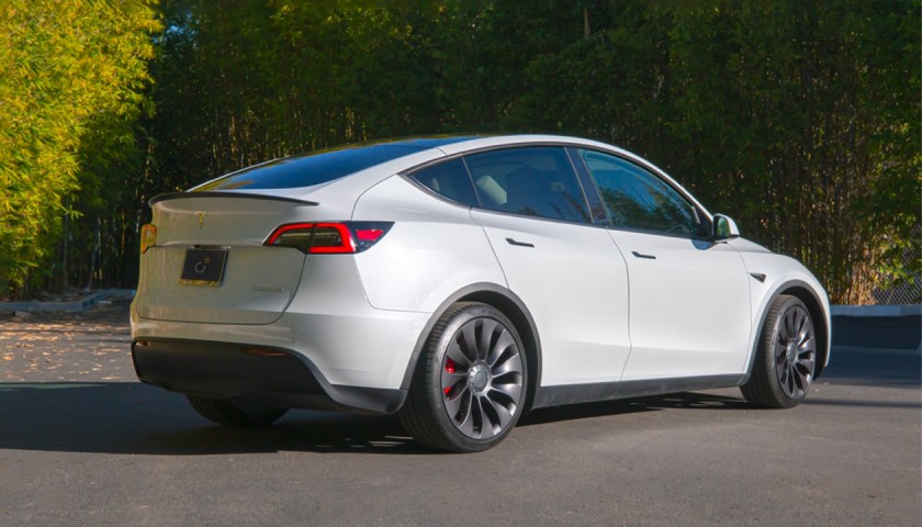 Win a 2022 Tesla Model  Y Performance and $10,000