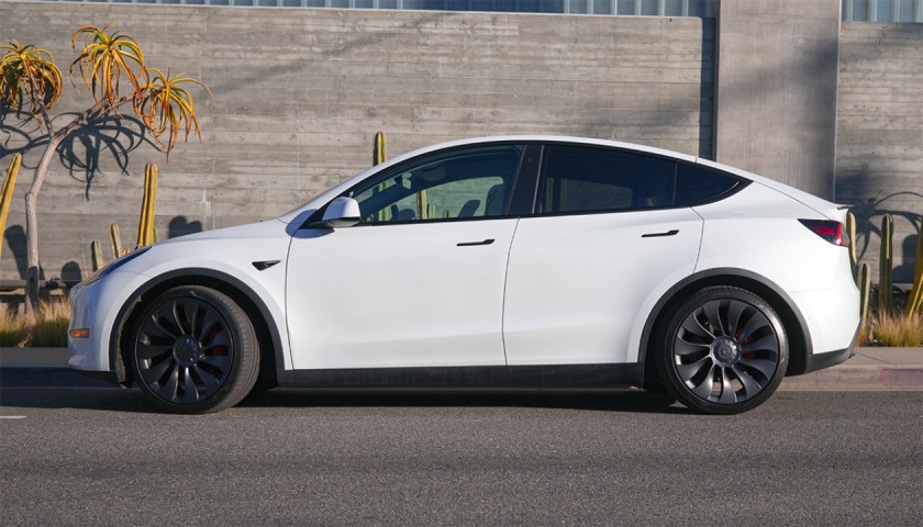 Win a 2022 Tesla Model  Y Performance and $10,000
