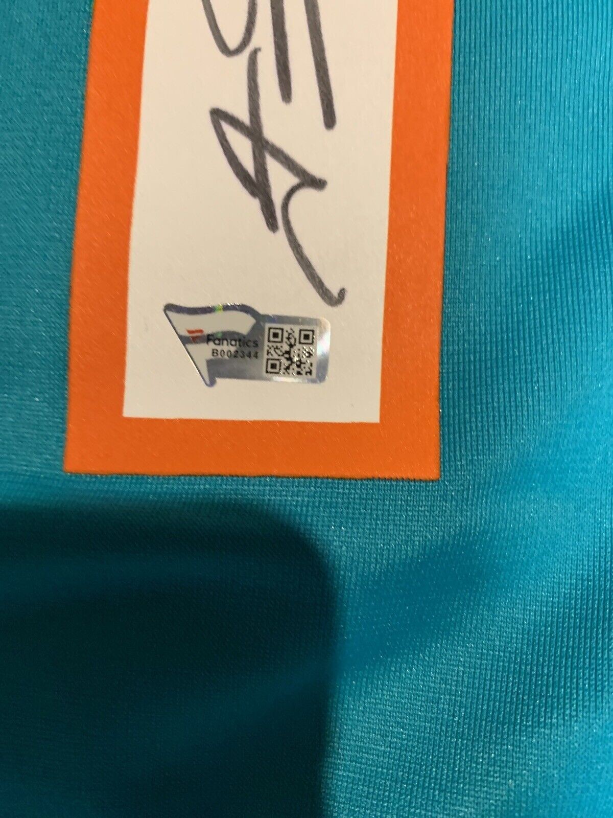 Tua Tagovailoa's Miami Dolphins Signed Jersey - CharityStars