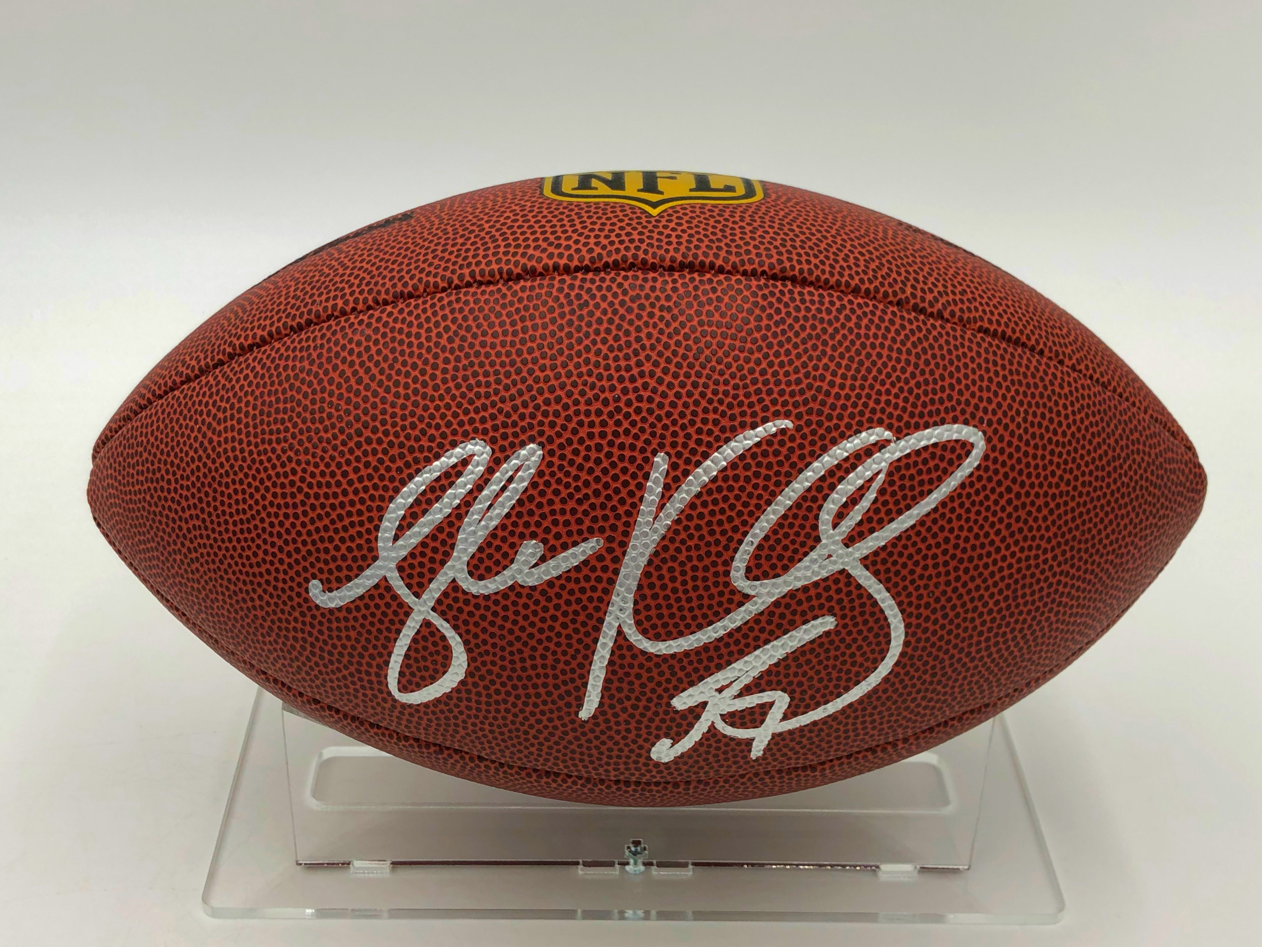 Luke Kuechly Signed Football In Display Case - CharityStars