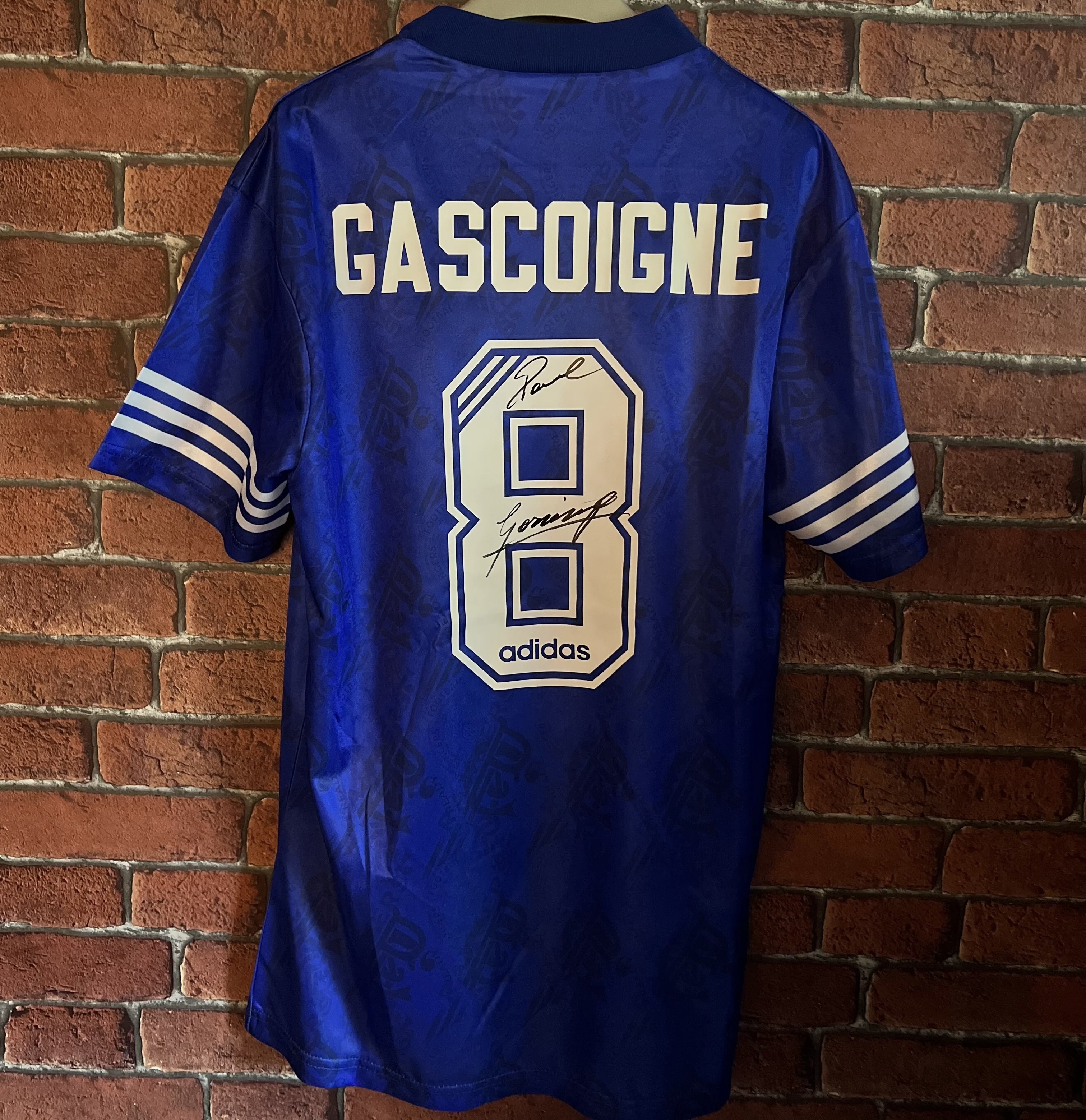Paul Gascoigne Signed Rangers Shirt - 1996-1997, Nine In A Row (Signed In Silver, Top) - Genuine Signed Sports Memorabilia