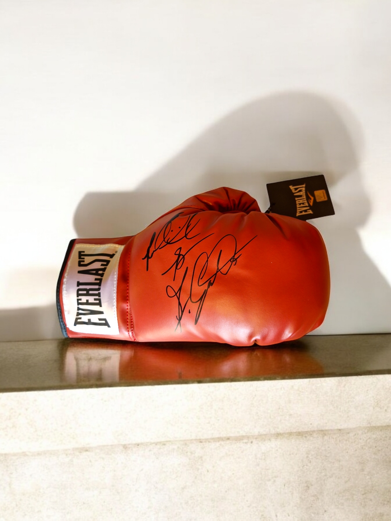 Riddick Bowe Signed Boxing Glove sold