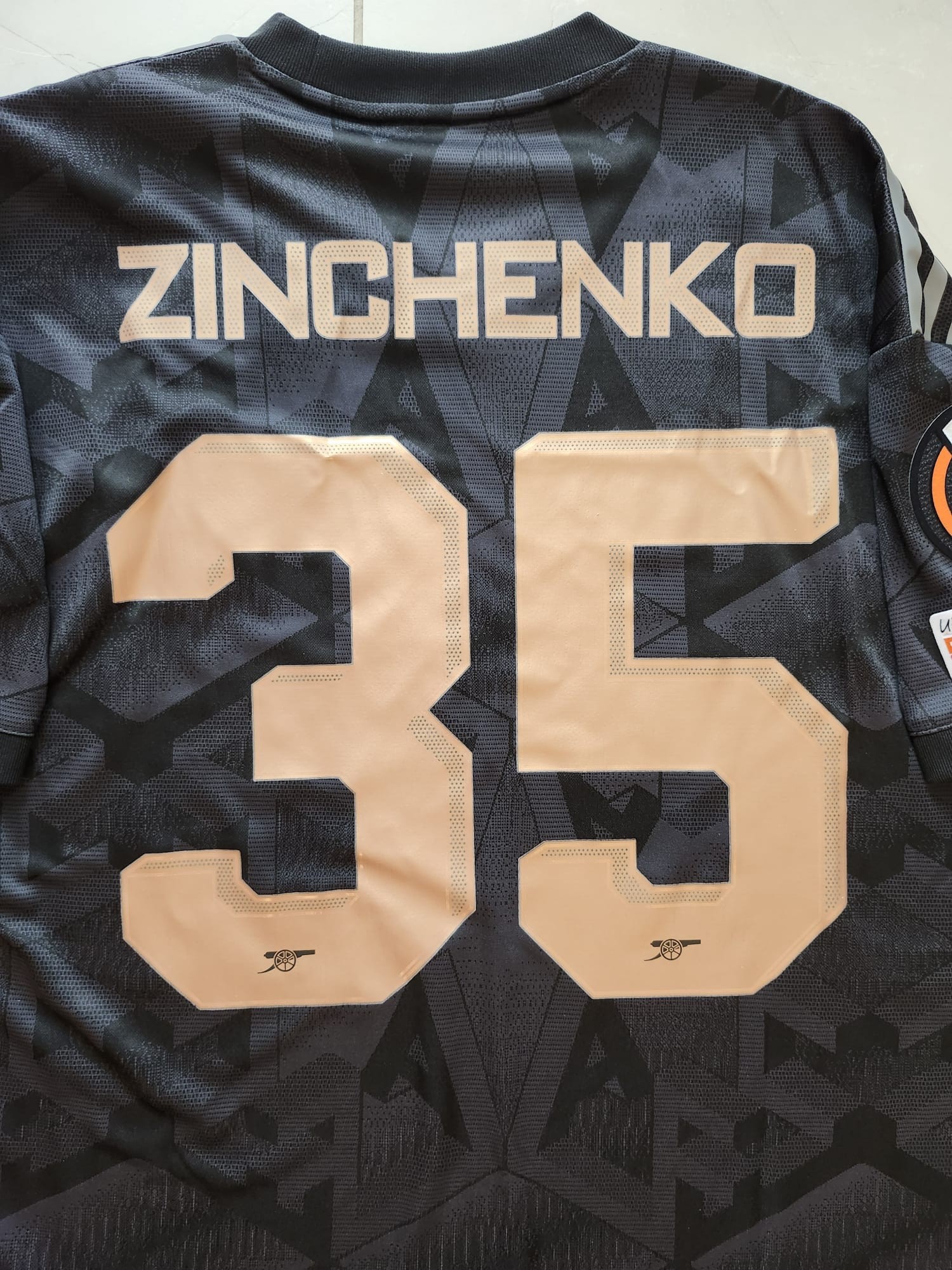 Oleksandr Zinchenko's Official Arsenal Away Shirt - CharityStars