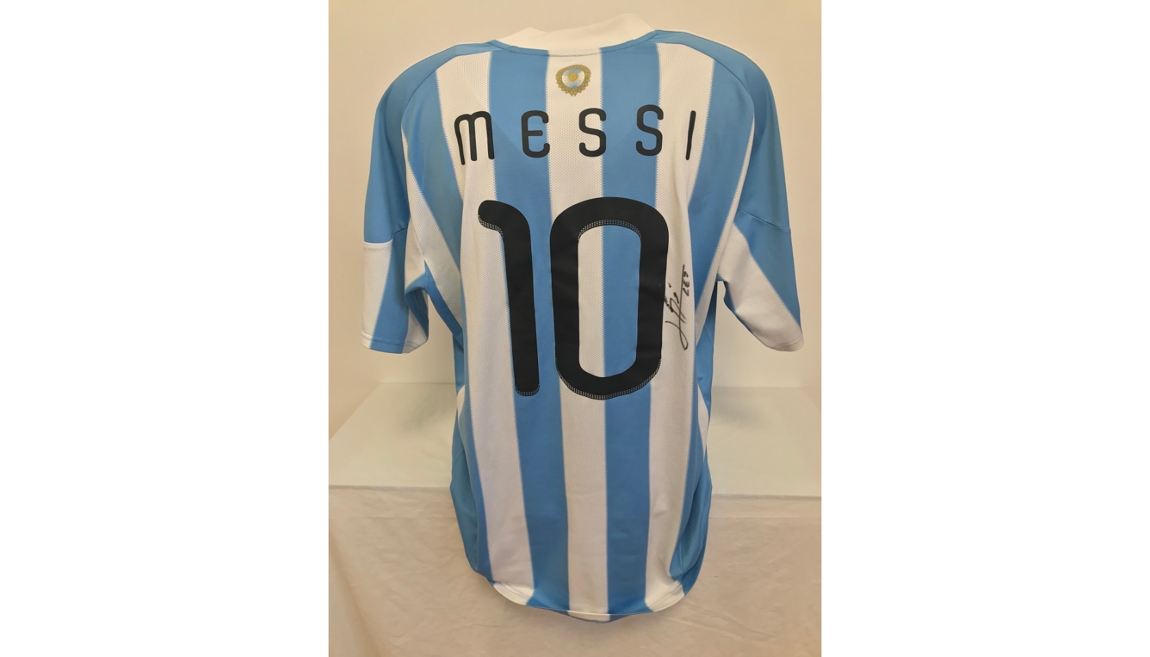 Messi's Official Argentina Signed Shirt, 2010/11 - CharityStars