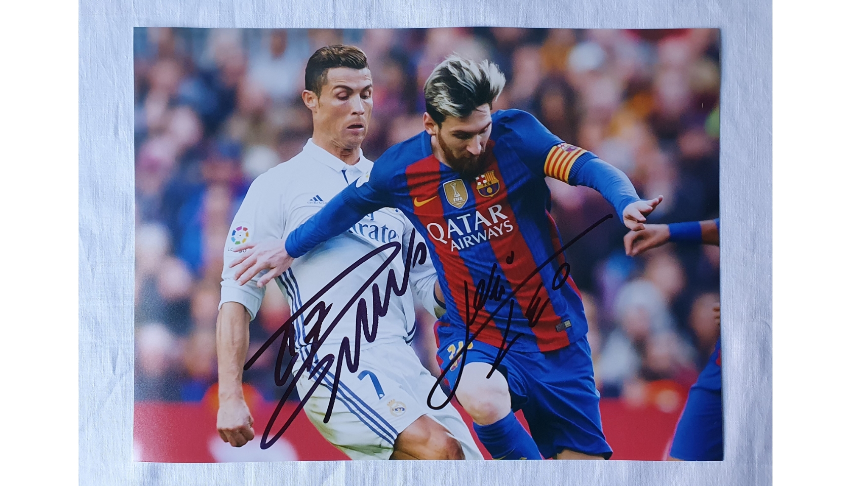 Sold at Auction: DOUBLE FRAMED LIONEL MESSI & CRISTIANO RONALDO