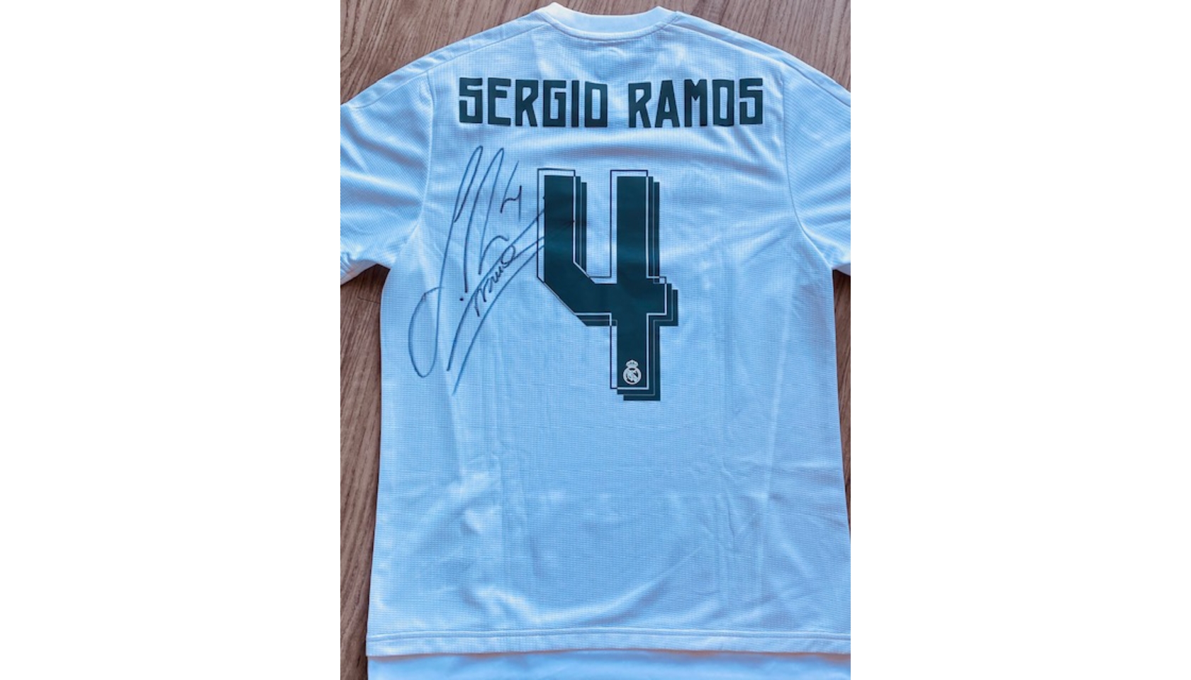 Charitybuzz: Real Madrid Autographed Jersey Signed by the Entire Team