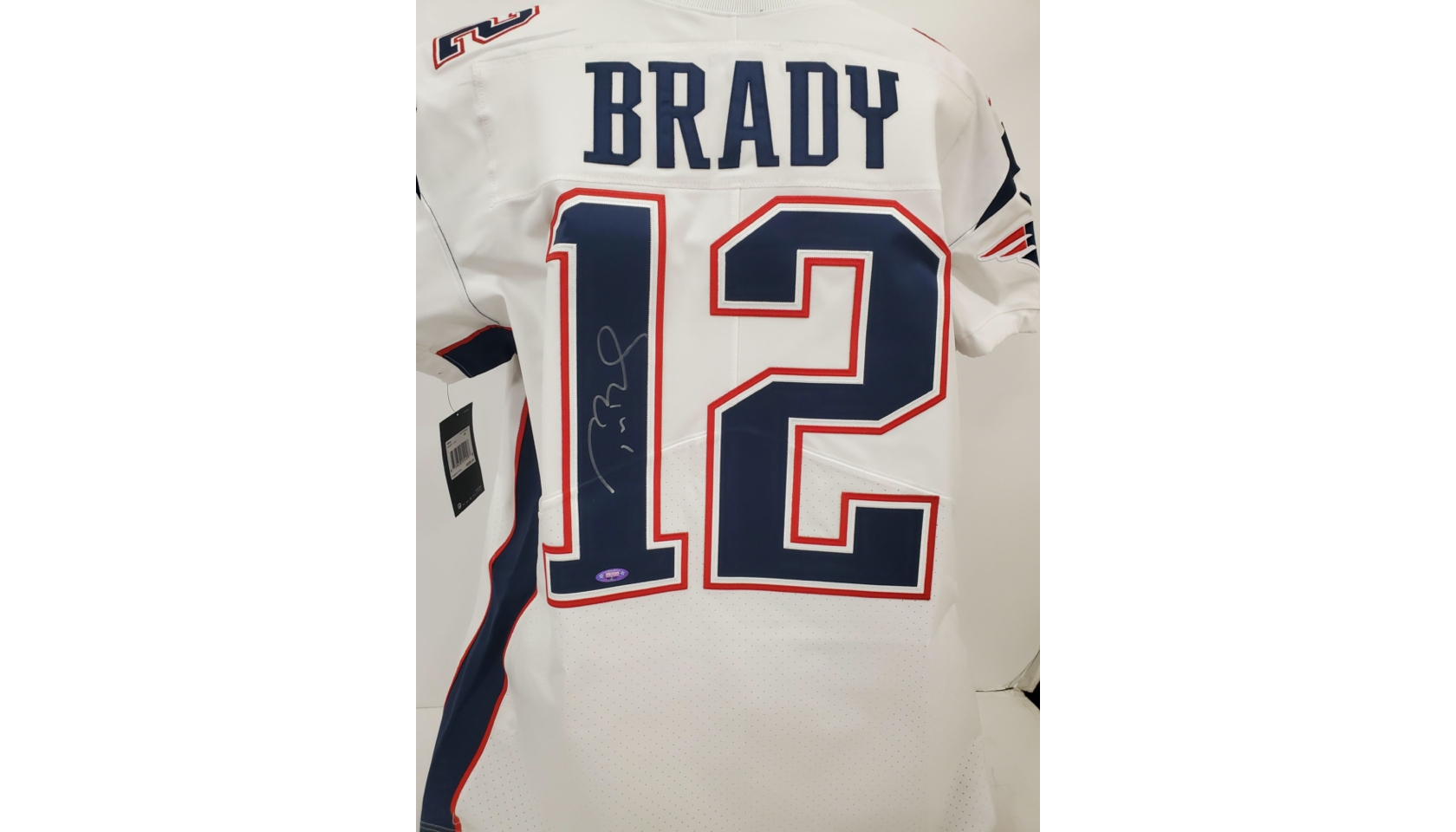 Mac Jones' New England Patriots Signed Jersey - CharityStars