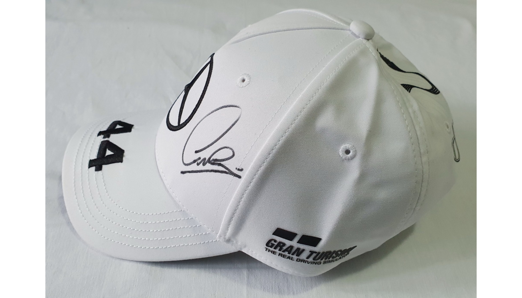 Official Mercedes Cap Signed by Lewis Hamilton - CharityStars