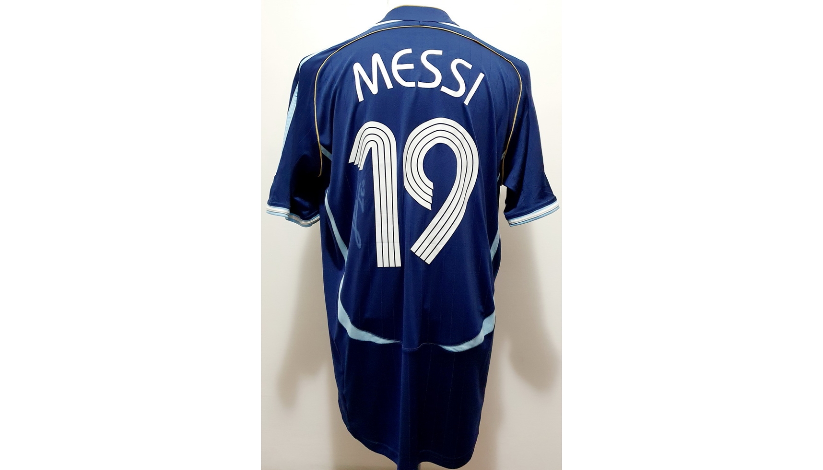 Messi's Official Argentina Signed Shirt, 2006 - CharityStars