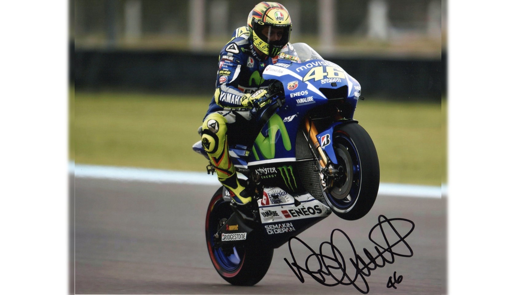 Valentino Rossi Signed Photograph - CharityStars