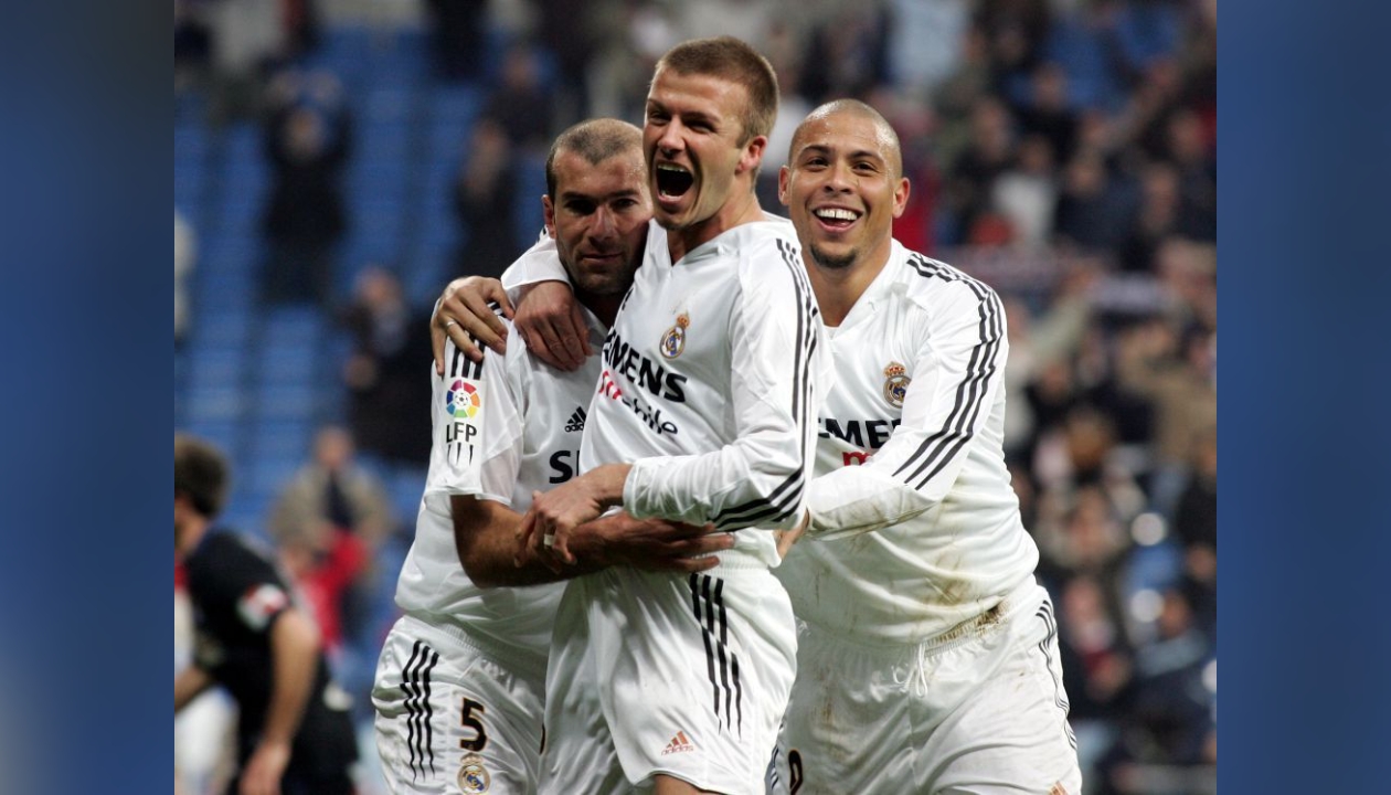 A Glazed and Framed Signed Real Madrid Shirt 2004