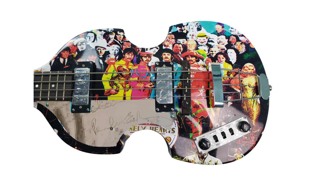 A Sgt. Pepper Hofner bass, signed by Paul McCartney, is up for auction
