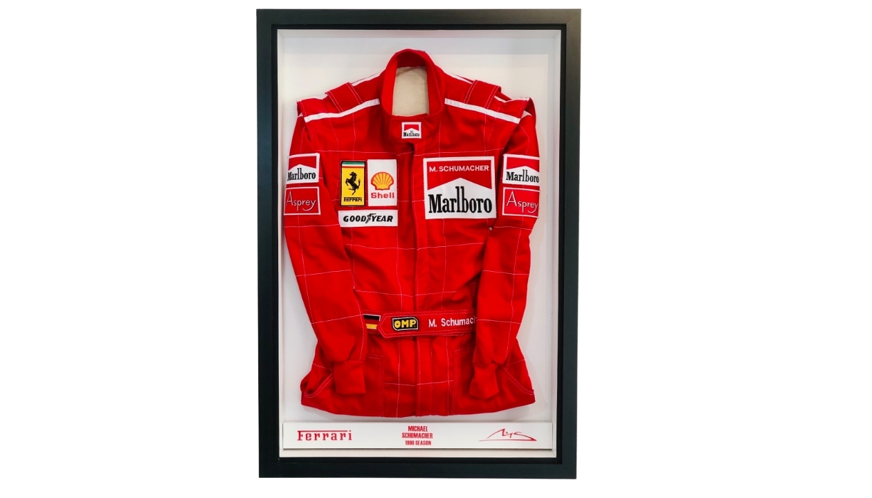 Giacca Ferrari autografata da Michael Schumacher - CharityStars