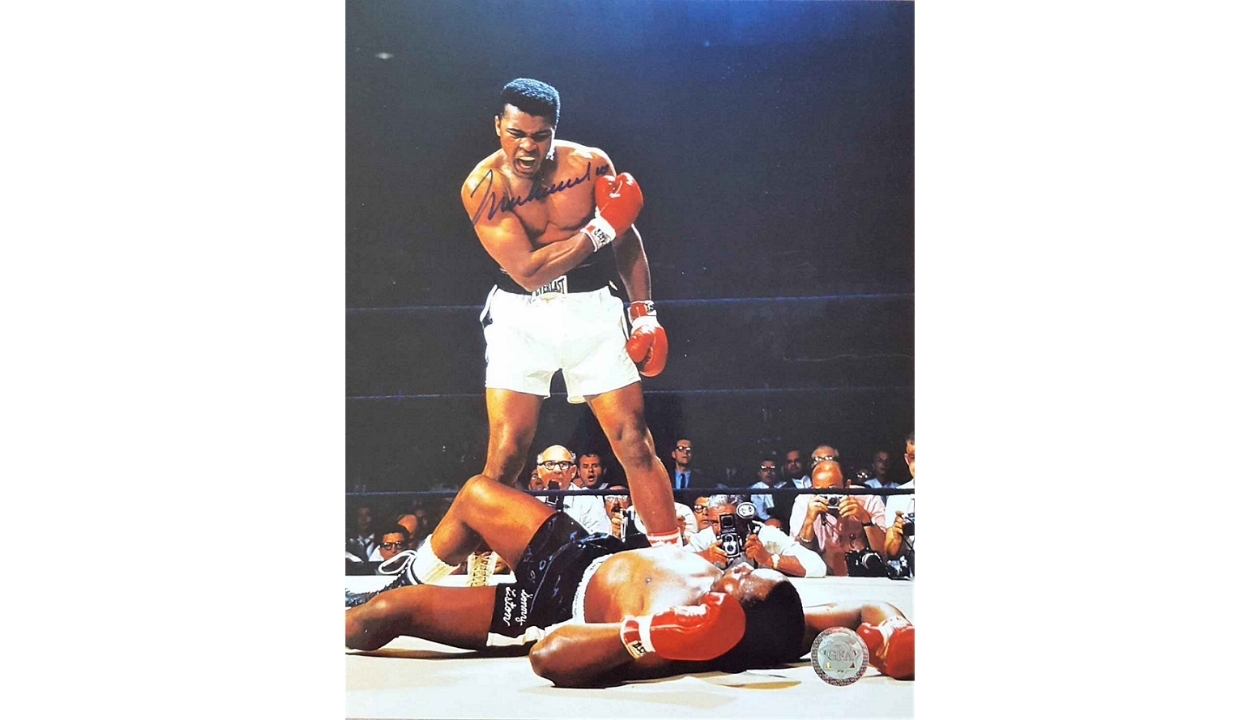 Muhammad Ali and C.J. Glove Up for Louis Vuitton