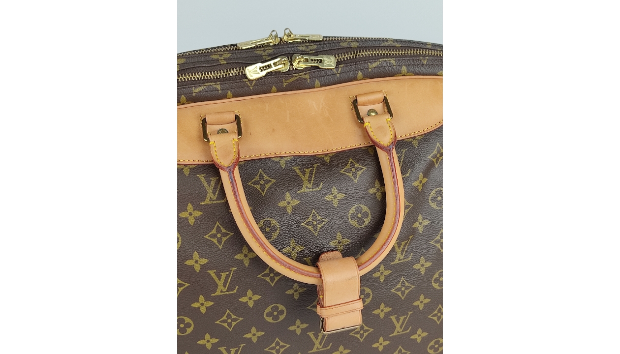 Louis Vuitton Travel Bag - CharityStars