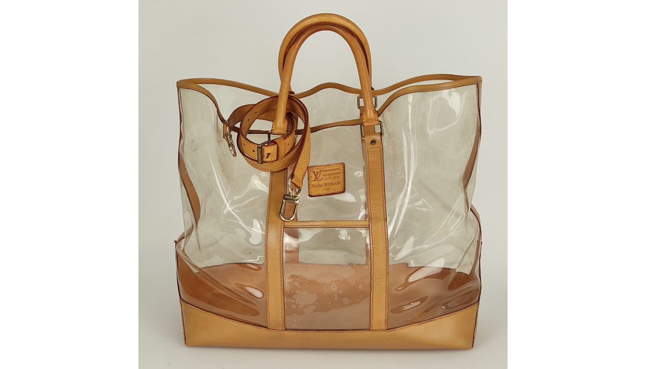 Travel bag Louis Vuitton Orange in Plastic  16344844
