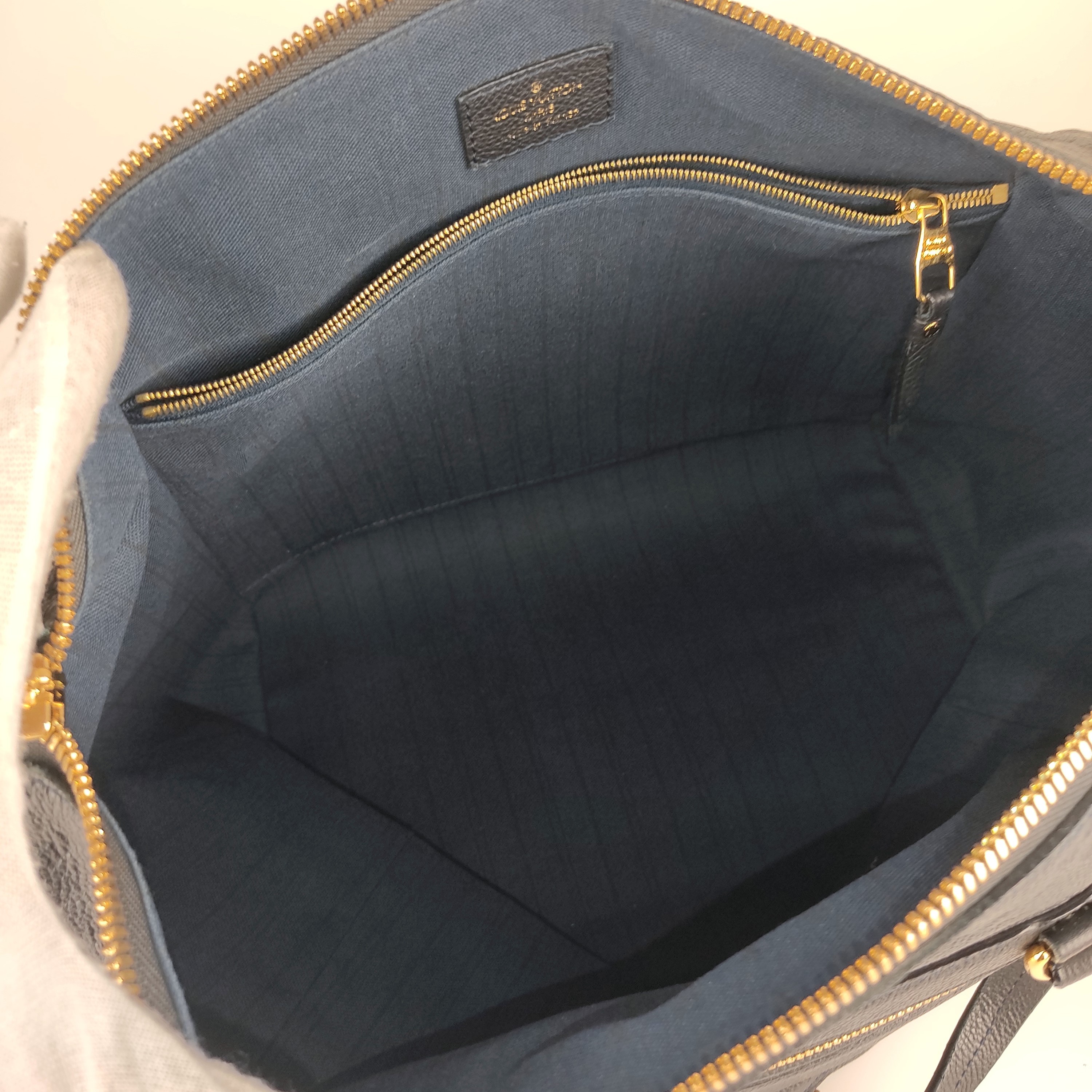 Louis Vuitton Lumineuse Blue Leather Handbag - CharityStars