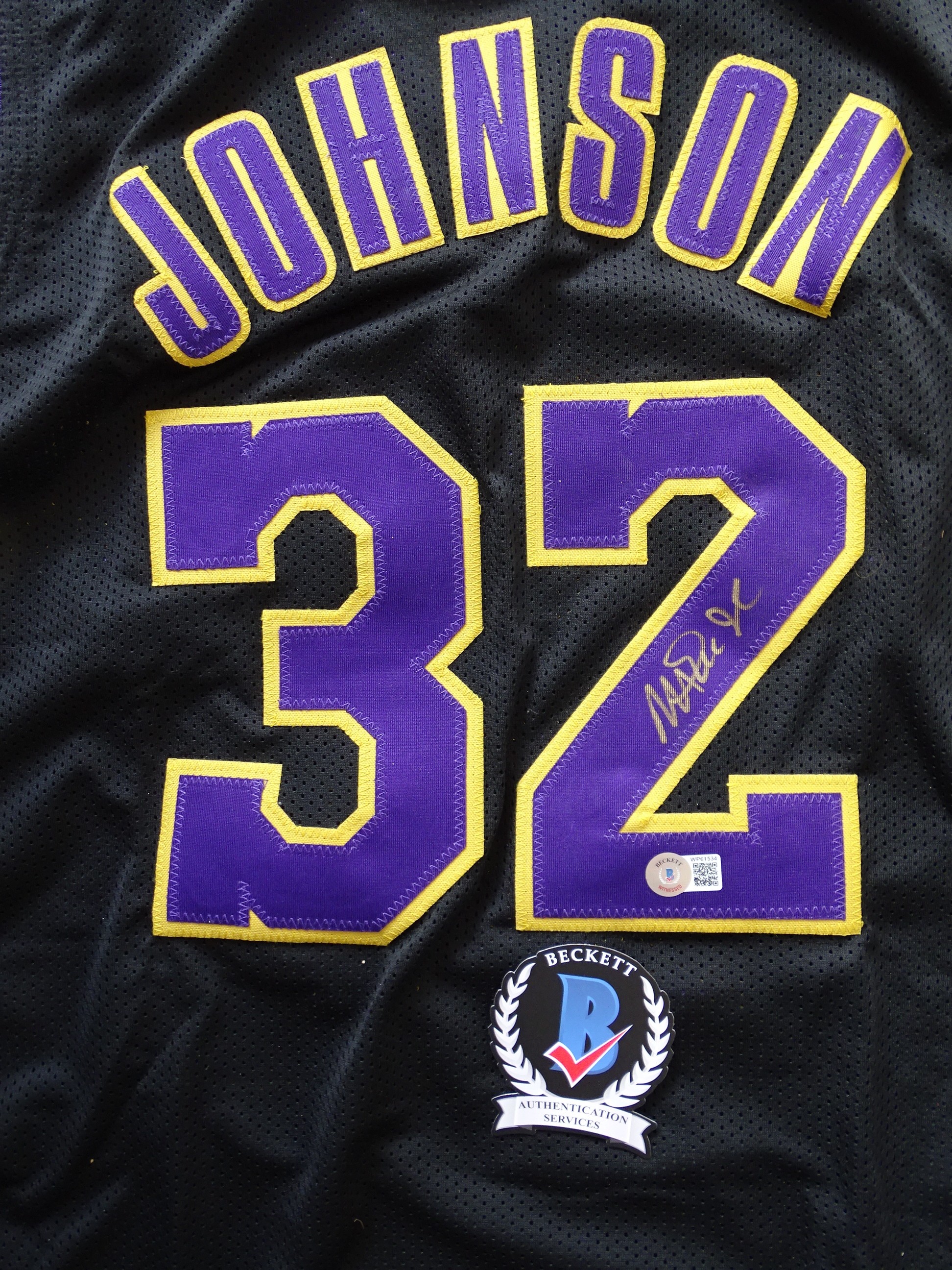 Magic Johnson's Official LA Lakers Jersey - Signed by Johnson and Bryant -  CharityStars