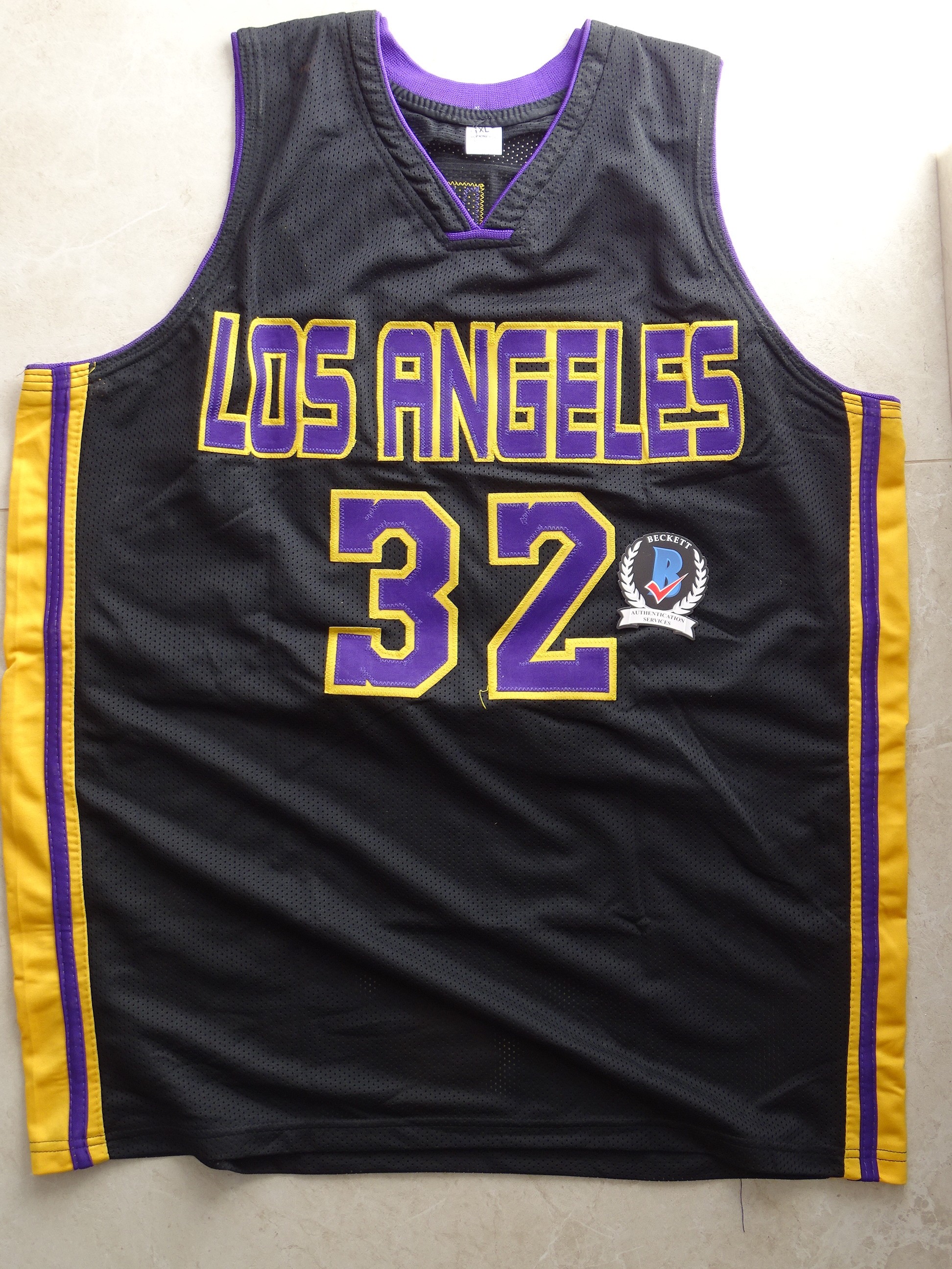 Magic Johnson's Official LA Lakers Jersey - Signed by Johnson and Bryant -  CharityStars