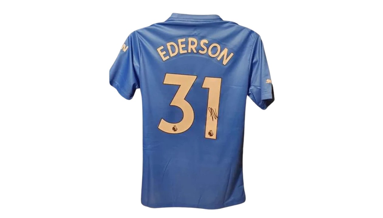 Ederson's Manchester City Signed Shirt - 2022/23 - CharityStars