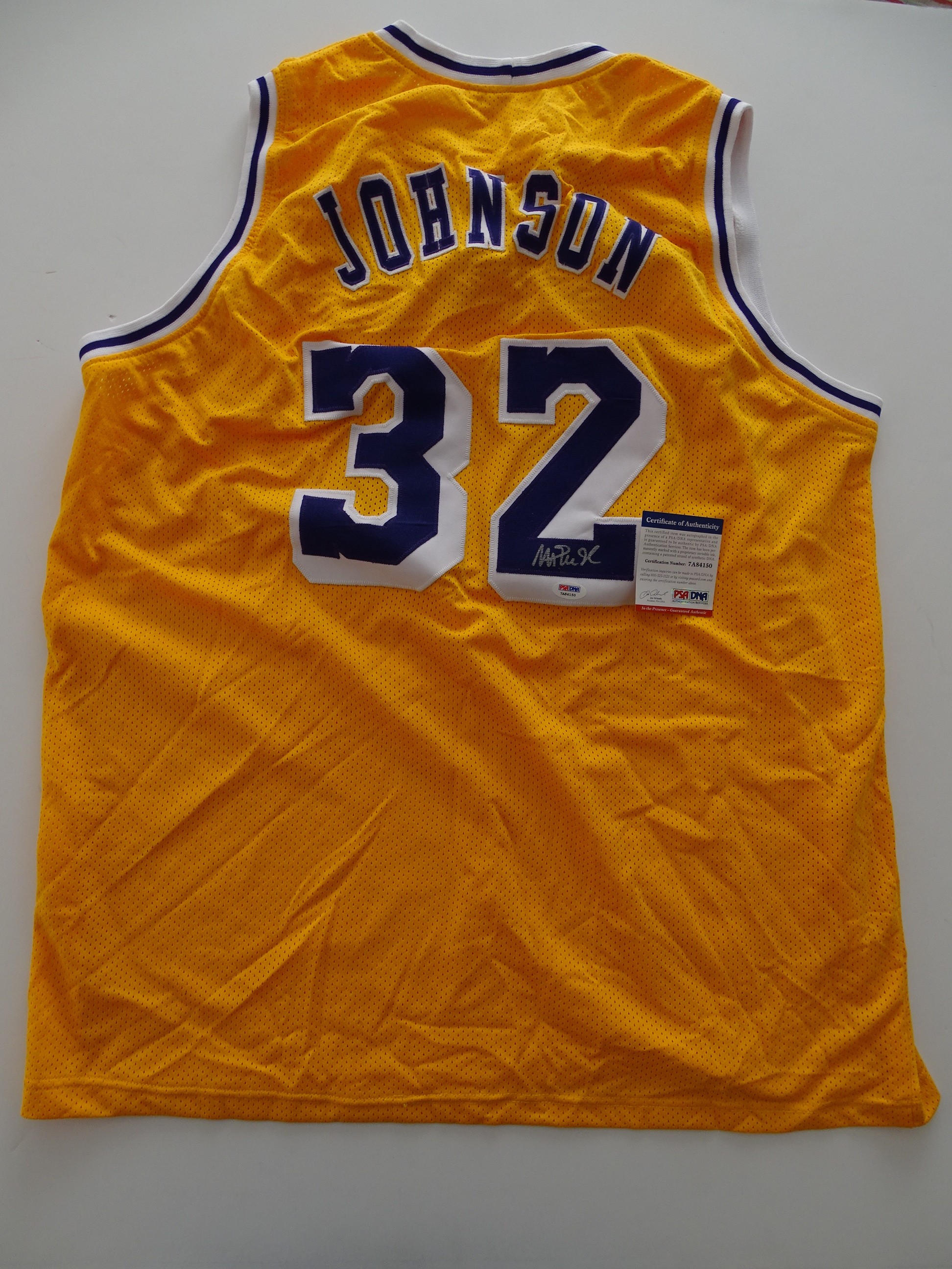 Magic Johnson's Official LA Lakers Jersey - Signed by Johnson and Bryant -  CharityStars