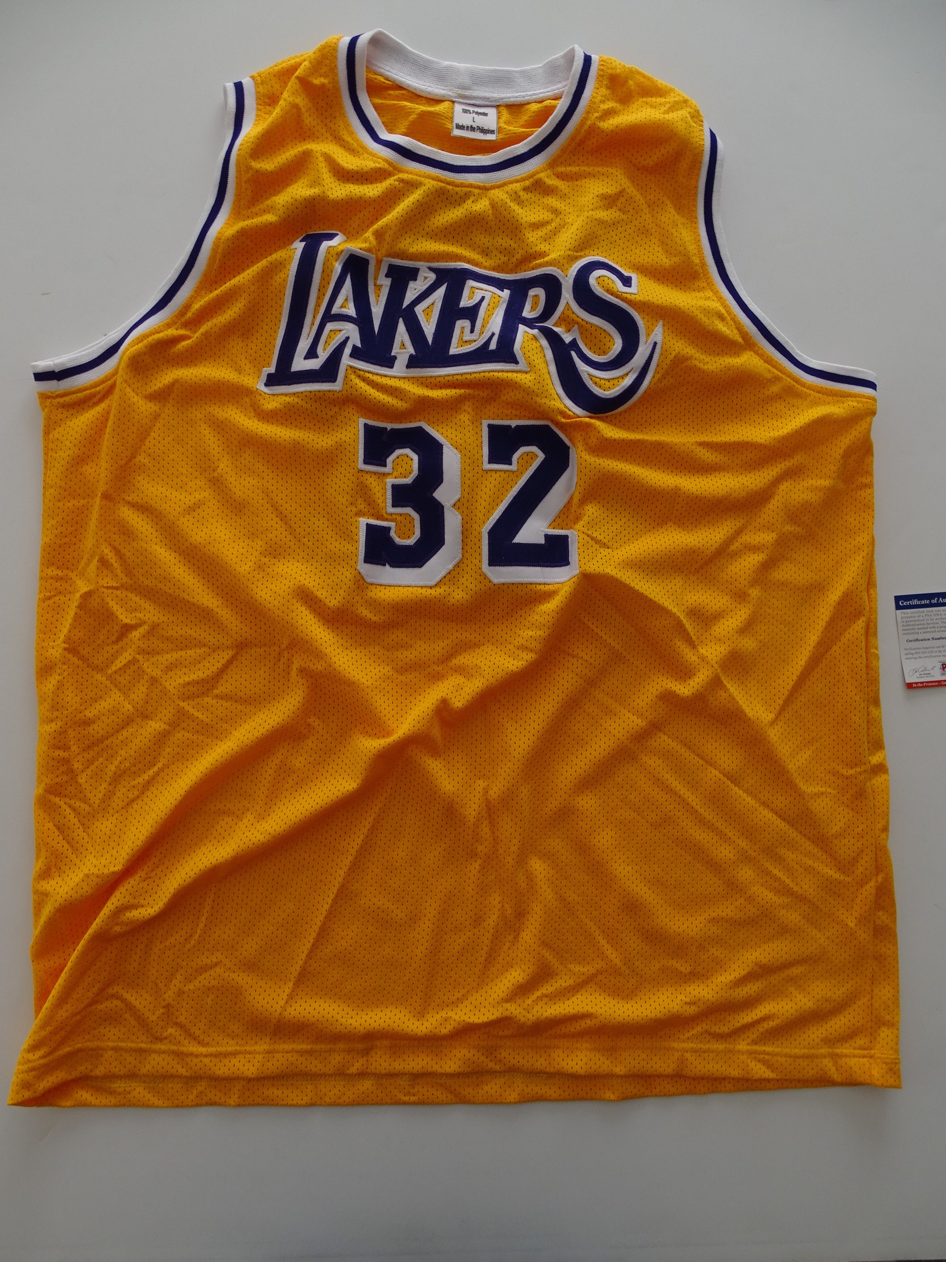 Magic Johnson's Official LA Lakers Jersey - Signed by Johnson and Bryant -  CharityStars