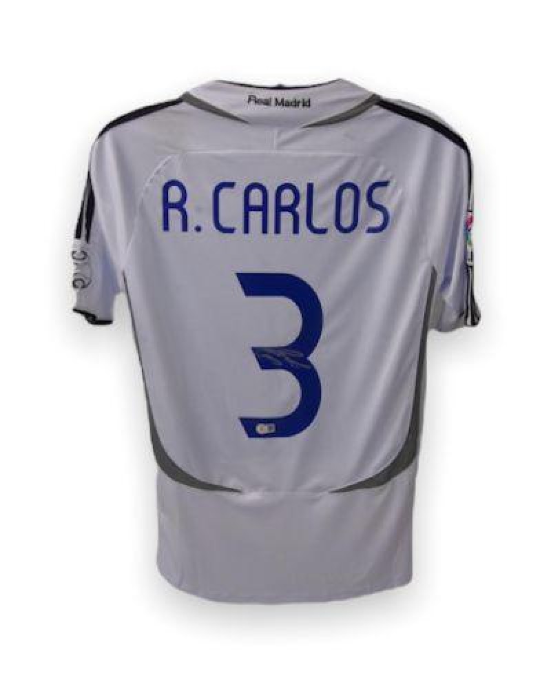 Camiseta de local del Real Madrid firmada por Roberto Carlos (1999-00). Marco icónico. - España