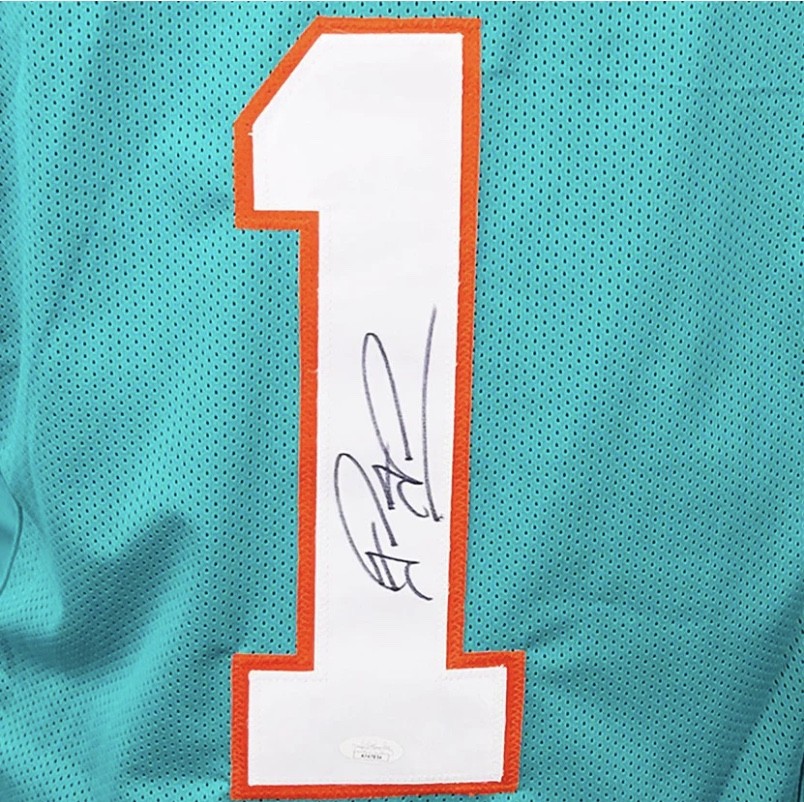 Tua Tagovailoa's Miami Dolphins Signed Jersey - CharityStars